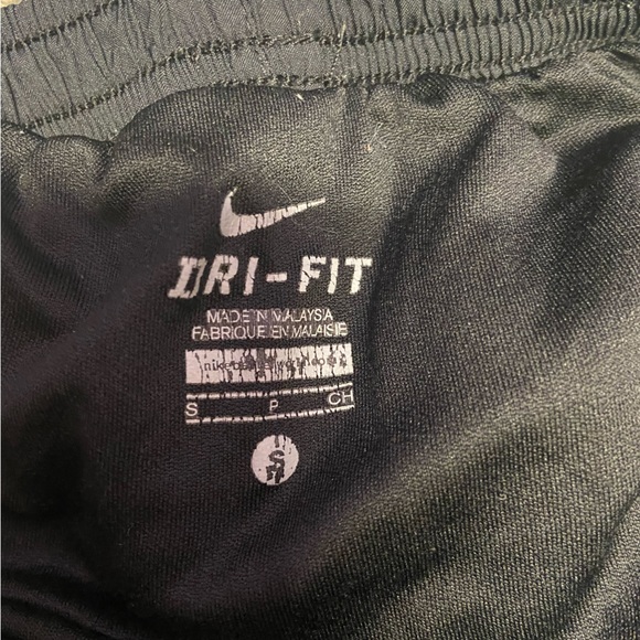 Nike: purple, black, and lime green Nike athletic shorts - Picture 4 of 4